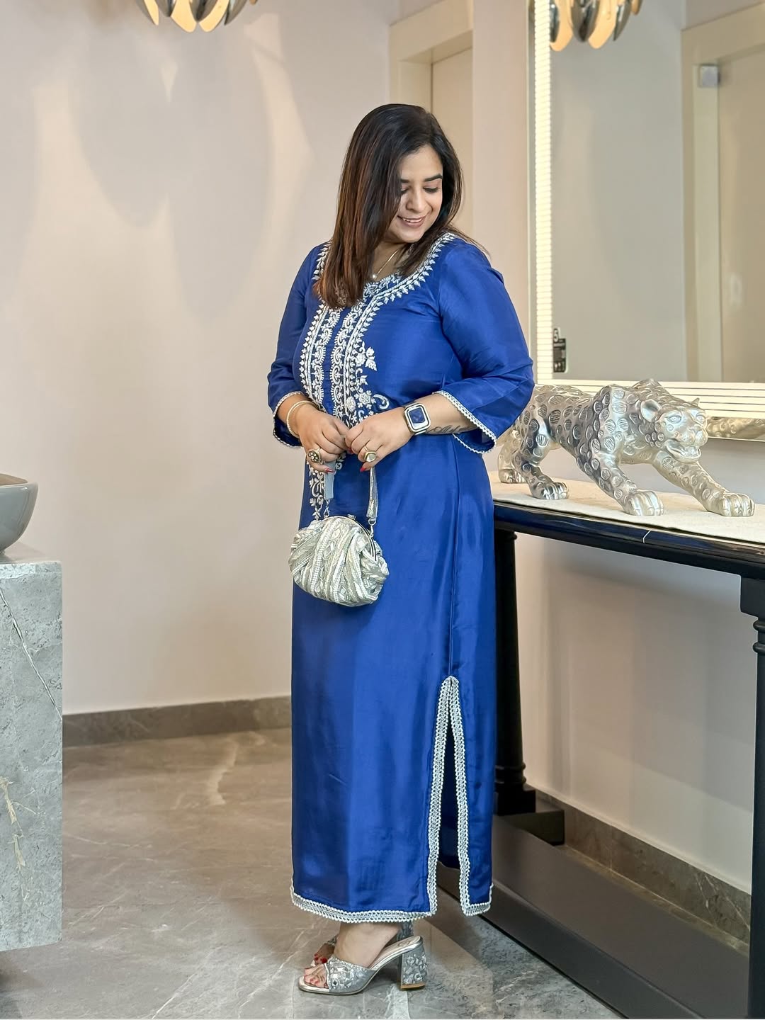 This long Indo-Western dress is crafted from premium fabric, featuring intricate hand embroidery (2)