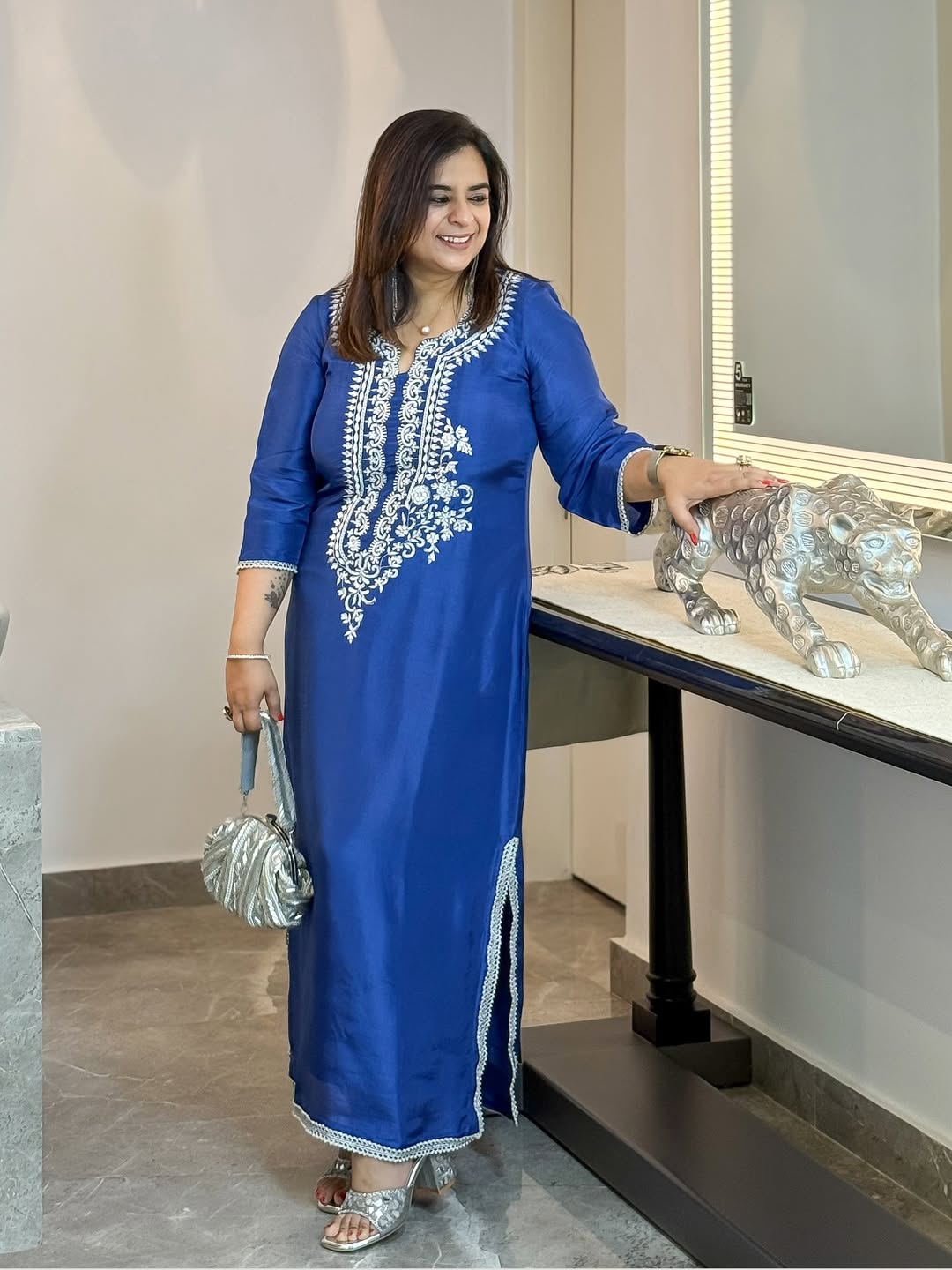 This long Indo-Western dress is crafted from premium fabric, featuring intricate hand embroidery (3)