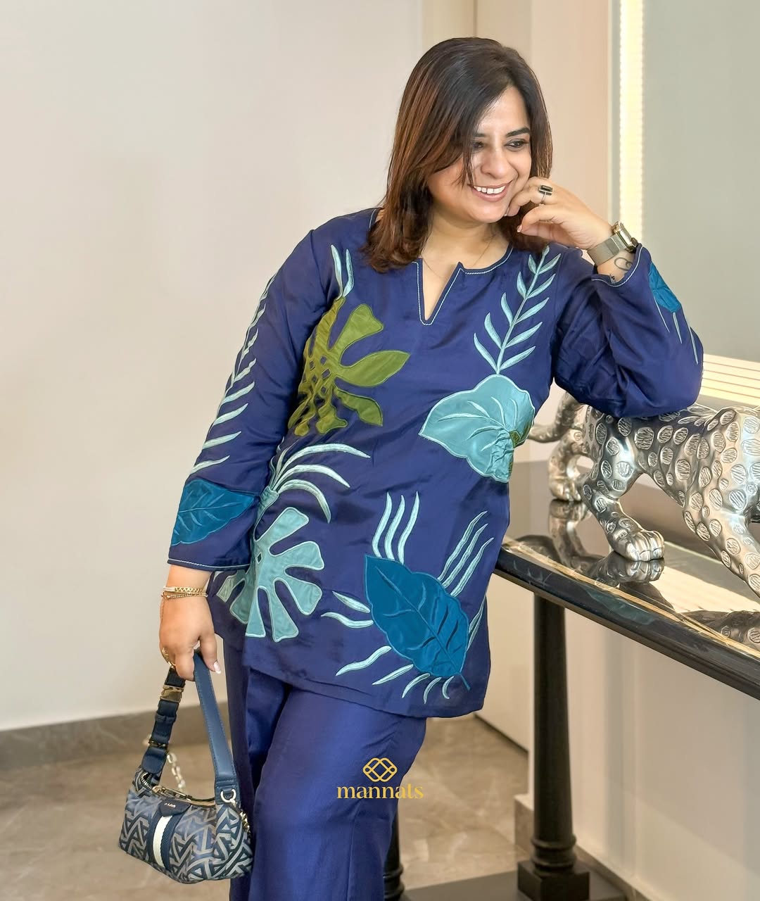 Where silk meets sophistication, and every stitch tells a story.This corset-style, adorned with