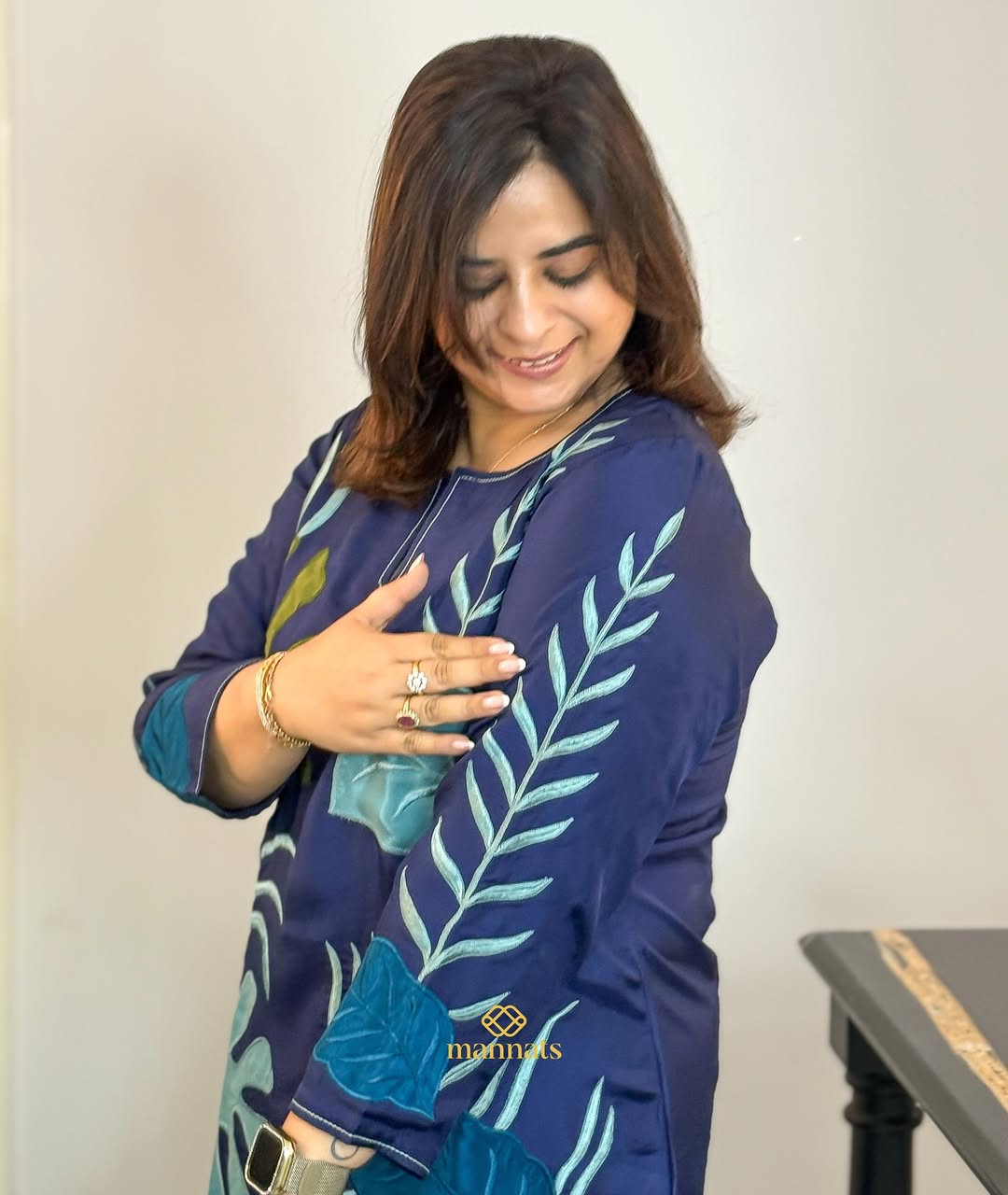 Where silk meets sophistication, and every stitch tells a story.This corset-style, adorned with (5)